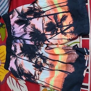 Swimmer shorts from Cat&Jack. Tropical/Palm tree themed.
